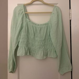 green ruffle top